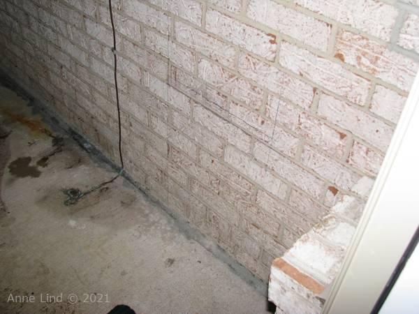 Brick wall before door