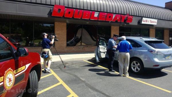 Lexus running into Doubleday's window